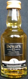 Dewar`s
twelve 12 years old
special reserve
blended scotch whisky
over 80 gold & prize medals
distilled blended & bottled by
John Dewar & Sons Ltd
Pertshire Scotland
40%