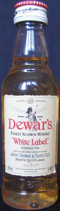Dewar`s
finest scotch whisky
white label
established 1846
distilled blended and bottled by
John Dewar & Sons Ltd
40%